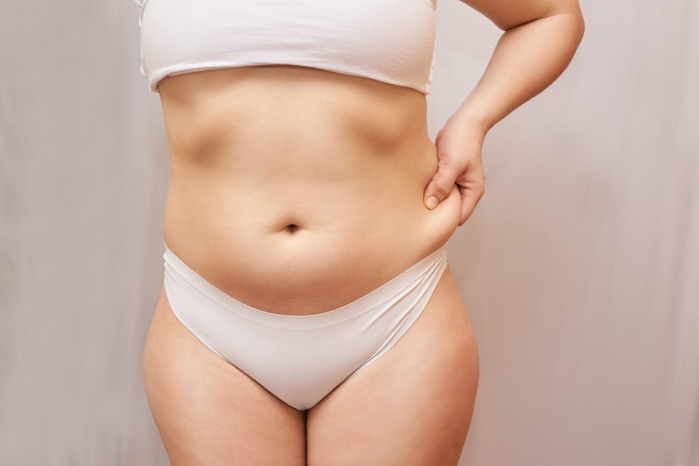 Avoir le pubis gonflé après une liposuccion : causes et traitements